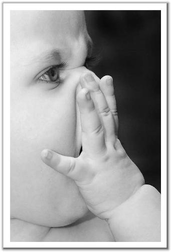 frowning. - baby is frowning.