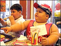 Fat american kid - Mcdonalds can really brig out the pig in your.  www.habboxb.com