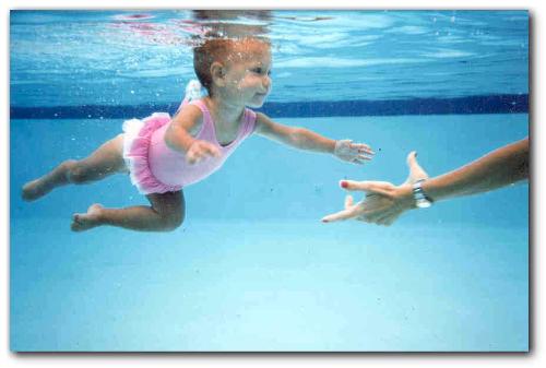 Baby swimming to her mother! - Isn't she a cutie!  I love seeing babies swim underwater!