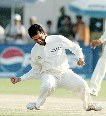 Sachin Tendulkar - Sachin Tendulkar celebrates after taking a wicket.