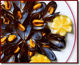 Mussels - this is a special italian dish called "impepata di cozze".
