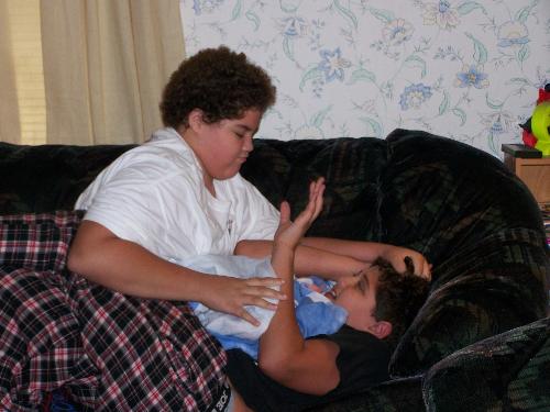 my daughter  - getting him back for sittin on her
