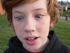 Murphy crosses his eyes - This is my oldest son, Murphy. He just learned to cross his eyes. He is 11 1/2 years old and goes to a Spanish Immersion Middle School.His is a digital world. He loves to play on his Game Cube and the computer. He goes to the comic book store on Saturdays to play in Pokemon Tournaments and on Sundays to play Hero Clix. He's a fan of Homestarrunner and The Simpsons.