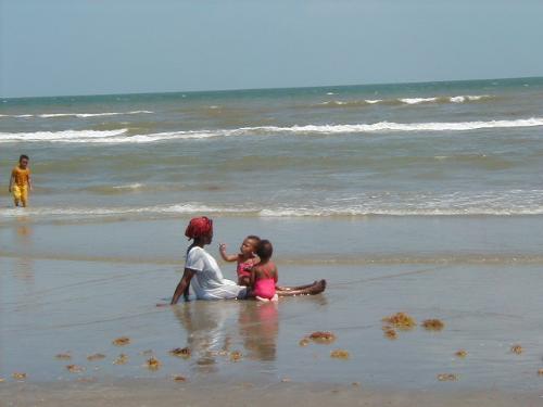Me and the twins on the beach - This picture was taken during our vacation last year. This is my favorite picture of me and my twin girls on the beach in Galveston.