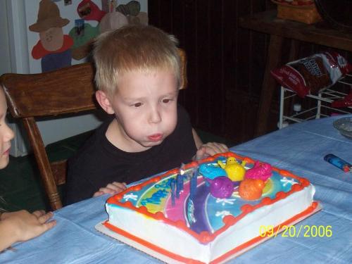 my son on his 5th b-day - my son on his 5th b-day, blowing out his candles
