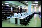 Computers at the Library - Long row of computers in the library Computers at the Library - Long row of computers in the library