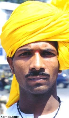 Indian Turban - This guy is wearing a yellow turban. Does that represent something or did he just feel like wearing yellow that day?