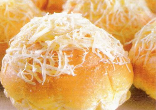 cheese bread - bread topped with grated cheese
