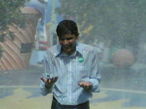 Me dancing in the rain - Hey guys its me in Ramoji Film city,Hyderabad having fun with my friends.