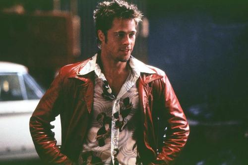 brad pitt  - this is a scene of the movie 'fight club' here, brad pitt is wearing a casual jacket and a very nice shirt (inside) and giving us a very suspicious look!!!!!! this guy is a dude, oh really