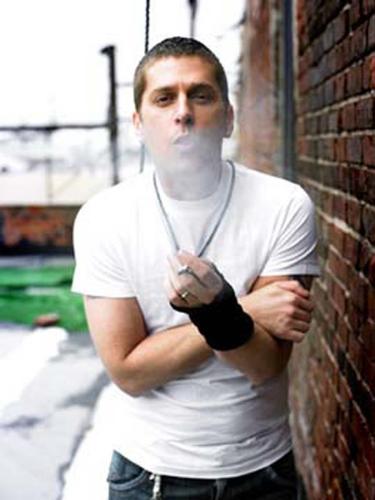 rob thomas  - This is one of the latest picture of Rob thomas 
In this picture he is releasing smoke in a very stylish way 
he looks really smart in this picture
This is his new hairstyle , isn&#039;t he kewl ???????????