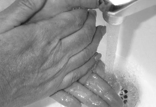 Washing hands - Hands being washed with soap and running water