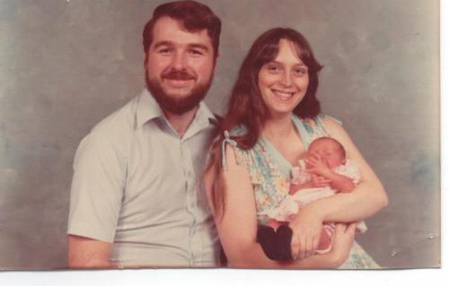 me and my parents - This is me and my parents. Aren't I cute! I wonder what happened? lol