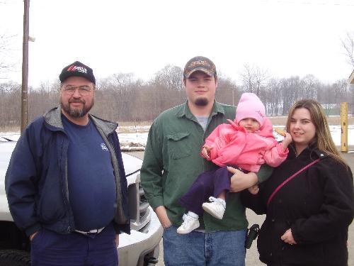 My brother and his family - From left to right is my dad, my brother, his daughter and my sister in-law