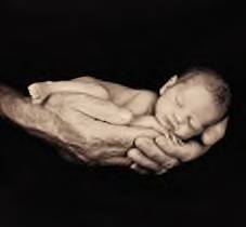 Anne Geddes - I am a HUGE Anne Geddes fan!! I jsut LOVE her work!!