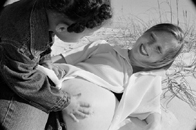 My daughter and I - My daughter admiring my pregnant belly