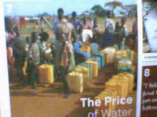 people fetching water - This photo shows the African people are fetching water at the watertap.