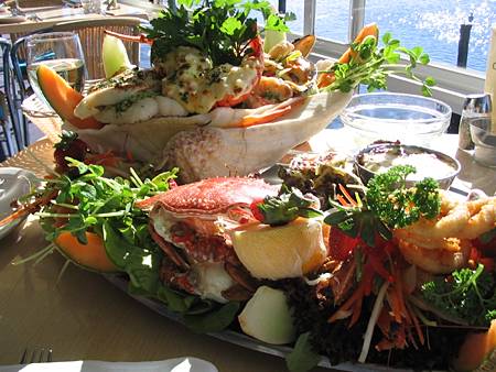 Seafood - A dish of seafood served by the seaside in the Mediterranean. Seafood - A dish of seafood served by the seaside in the Mediterranean.