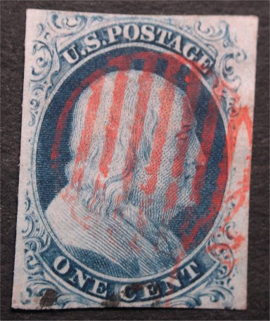 us #7 - US number 7 imperf, issued in 1851. Picturing Benjamin Franklin. Appointed as the first US Postmaster by the Continental Congress in 1775.