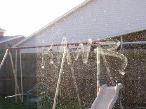 My window - This is my window, one day I found this written 'Rawr' Crazy huh?