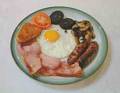 breakfast food - plate of eggs and sausage and other breakfast foos