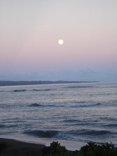 Moonrise - A moonrise over Kekaha Beach.