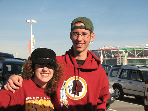 Redskins Football pt. 5 - Picture of two of the washington redskins fans outside the stadium.