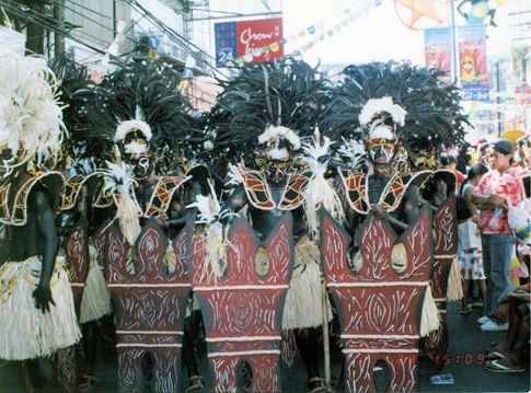Philippine Festival, Dinagyang - A tribe of warriors in the dinagyang festival taking a break after a performance