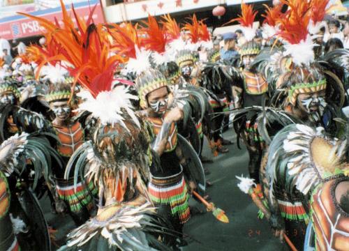 Dinagyang festival, Iloilo Philippines - A group of warriors taking a break after a performance in the dinagyang festival