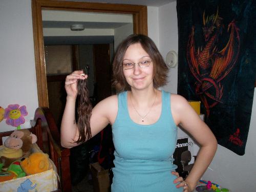 Chopped it off! - This is a picture of me, i decided it was time for the hair to go, and i cut enough off so that i could donate it to the canadian cancer society.