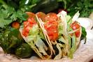 Taco - 3 bean taco, delux with tomatoes.