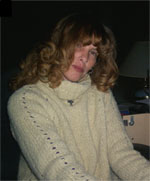 Me - details are like the color of my sweater is yellow sitting at my desk
