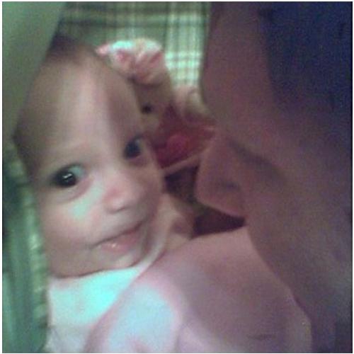 Dad and baby - Daddy's being silly and baby knows it. What she likes now will be morbidly embarrassing to her as a teenager.