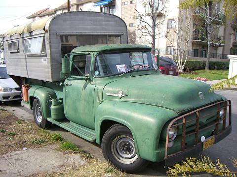 old truck - a cool rustic old truck/home in the back of a car..thing