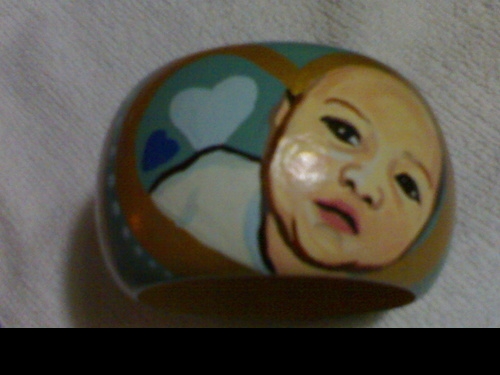 son photo in a bangle - chic personalized bangle. this one is the photo of my friend's son. :)