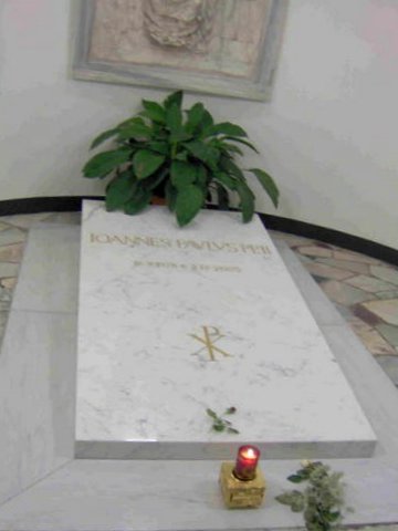 The Tomb of John Paul II - This is the tomb of the late Pope John-Paul II in Rome, as it looked in September 2005. When we went, you had to file past it in a queue of tourists. At the side of the tomb was a place where nuns and monks who were on a pilgrimage to Rome could wait with the Swiss Guard and spend longer looking at the tomb. We saw several nuns, elderly women, kneeling on the cold marble floor (bare-kneed and without mats or cushion) beside the tomb and crying.