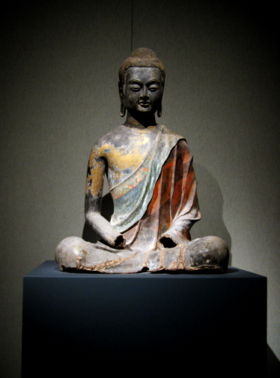 buddham sharnam gachchami - it is a statu of mahaaaan buddha