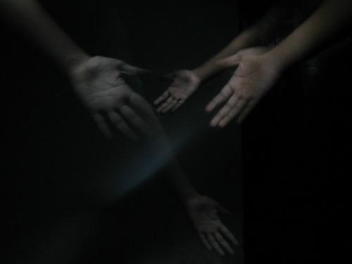 my hands - it is a trik with increased shutter speed in the dark and with a small source of light i swear it not editted 