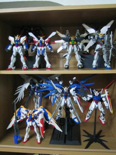 MG Gundams - from the top level there is only one MG (Master Grade) which is my Shining Gundam, My God Gundam, X Gundam, Double X Gundam, Master Gundam and Spiegel Gundam are just 1/100 scale models... and from the second level are all MG gundams... from left a Wing Zero Special Edition, Wing Zero Custom, Freedom Gundam and Strike Gundam