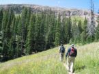 Hiking  - Hiking over long distances or over difficult terrain does require some degree of physical ability and knowledge, as well as a backpack to carry food, water and essential equipment.
