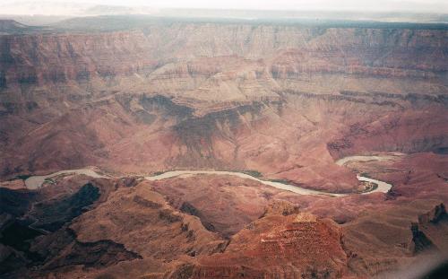 Greatness of Life - The meandering river is nothing compared to the vastness of the land surrounding it.  Yet, it is the same river that gives life.  Imagine yourself on the banks, trying to quench your thirst after days of wandering in the desert....  how small are you?  How big are you?  Are you just a dot in the picture?  Or will you fill the canyon?  Are you really above everyone else?  Or is there anyone above us?