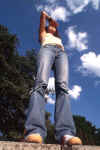 teenager standing on wall - one of the many awesome free photos I found at www.bigfoto.com