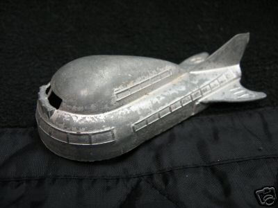 Buck Rogers space cruiser toy from 1950's - A Buck Rogers space cruiser car made during the 1950's in the U.S.A.  Midgetoy, Rockford, ILL.