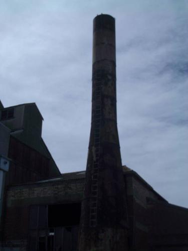 Old factory chimney, Melbourne, Victoria, Australi - This is an old disused factory chimney in Kensington. A suburb of Melbourne, Victoria, Australia.  Just near the Maribyrnong river.