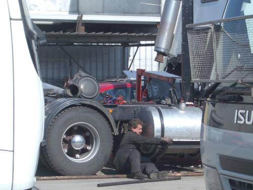 Repairing a truck - A man repairing his truck.  Sunshine, Melbourne, Victoria, Australia, Jan, 2007.