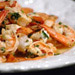 Shrimp Feta recipe - I will try this one too. I can't provide the link here, try Google. It sounds Greek to me, so it must be spicy.