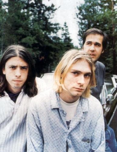 nirvana - nirvana is my favorite band because of their lead vocals. Kurt Cobain. He is just so good in playing the guitar and take note he is left handed...kind of cool. his guitar is not like the normal its the other way around....and he is just so cute. i love his hair...nirvana rocks