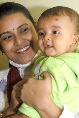 mother and child in happy mood - mother and child after pregnancy