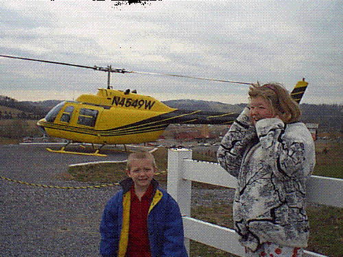 My son and daughter Feb. 2006 - This is a photo of my son and daughter at Pigeon Forge after our first helicopter ride.  They were very close and always got pretty well.  This was a family outting that everyone got along on.  Both were really excited about the helicopter ride.