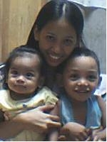 my sis, niece and son Deric - they all look cute!!!